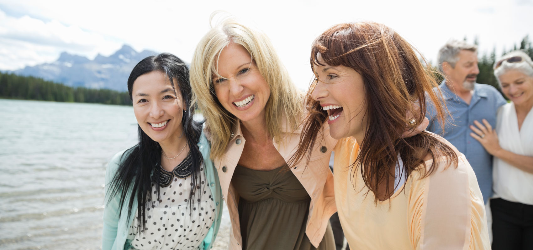 Three women laughing