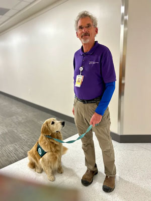 TAILS Program - showing dog and volunteer