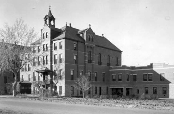 The granite structure of the new east wing of St. Anthony's, circa 1901