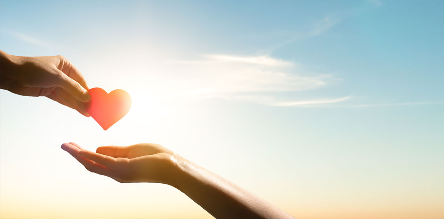 Heart going from one hand to another