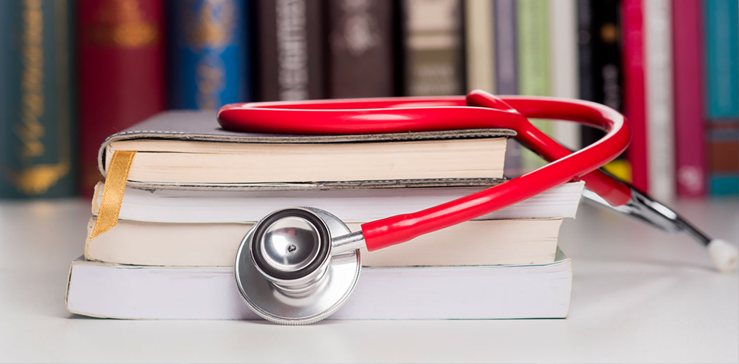 Stethoscope on medical books