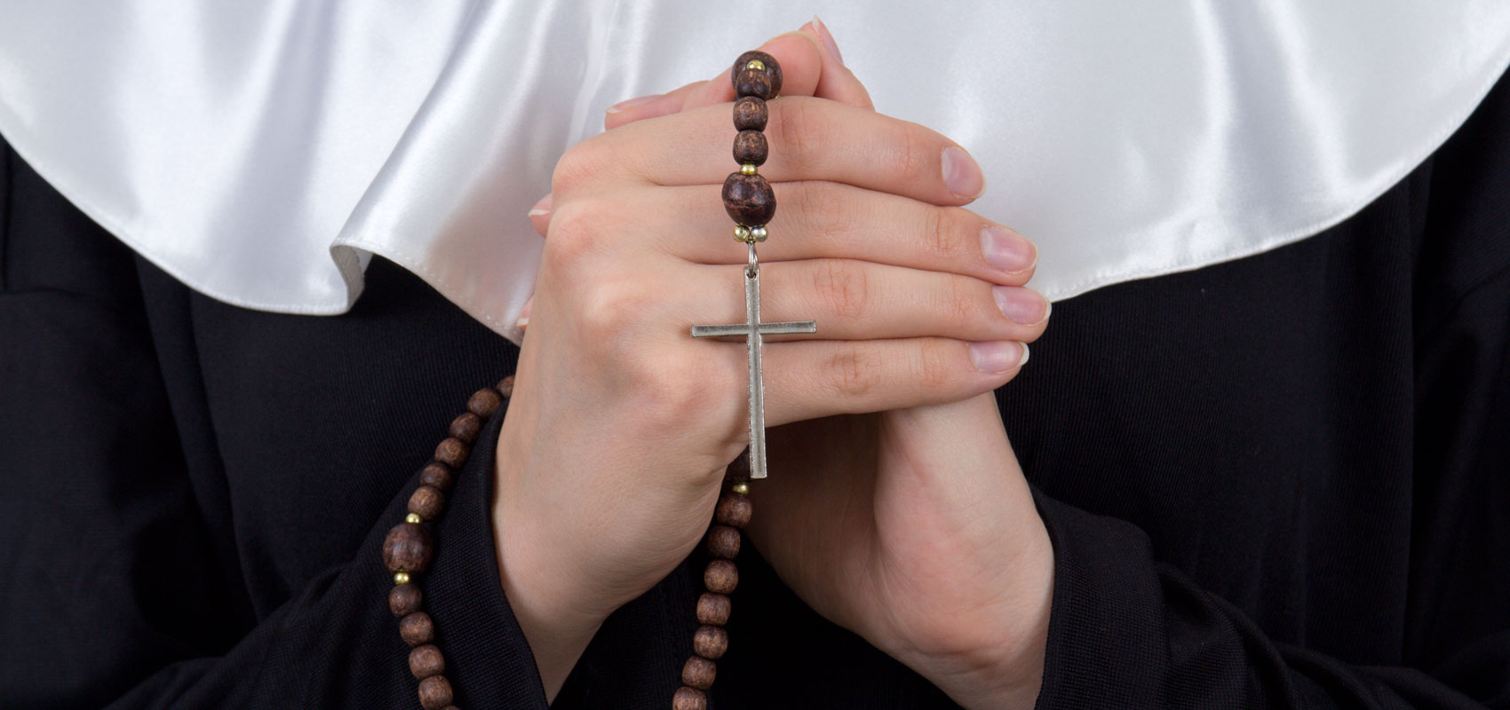 Rosary and Cross held by Nun Rosary and Cross held by Nun